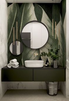 a bathroom with a sink, mirror and plants