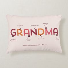 a pink pillow with the words grandma written on it