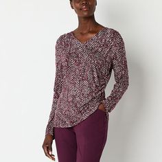 This Liz Claiborne women's v-neck blouse is a classic piece that will instantly become a go-to for chic everyday looks. Made from soft matte jersey, it has long sleeves and a ruched side to drape across your figure beautifully. Wear this comfortable style with anything from skirts to pants or jeans. Closure Type: Pullover HeadFit: Regular FitNeckline: V NeckSleeve Length: Long SleeveSleeve Style: Fitted SleeveApparel Length: 28.5 InchesFiber Content: 94% Rayon, 6% SpandexFabric Description: Matt Comfortable Style, Women Tunic Tops, V Neck Blouse, Red Blouses, Comfortable Fashion, Liz Claiborne, Everyday Look, Shirts Tops, Sleeve Blouse