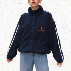 YVES SAINT LAURENT fleece - vintage 90s - navy with embroidered spell out logo - good condition but has bobbling as visible in the pics - has drawstring at the bottom - men's size XL but works for women too, pit to pit 25.25", shoulders 25.5", length 29", sleeve from pit to cuff 18.5", shown on a size 6/W24"/5'5" - price includes postage   Ysl jumper  Ysl sweater  Ysl sweatshirt Jacket coat  True vintage Y2k 00s streetwear Vintage Fleece Jacket For Winter Streetwear, Vintage Winter Fleece Jacket For Streetwear, Navy Fleece Outerwear For Streetwear, Navy Casual Winter Fleece Jacket, Navy Casual Fleece Jacket For Winter, Casual Navy Fleece Jacket For Winter, Vintage Fleece Outerwear For Streetwear, Navy Track Jacket For Streetwear In Winter, Navy Track Jacket For Winter Streetwear