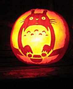 a pumpkin carved to look like a cat