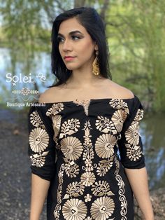 This Beautiful Mexican Gold Floral Dress is the perfect dress for a fun night out or a special event. It's made out of cotton and is full of gold embroidered details. The embroidery is premium quality and made with love by Mexican Artisans in Oaxaca, Mexico. Please note: The gold plated Mexican Filigree Earrings shown with this dress may purchased as well: https://www.etsy.com/es/listing/637147293/filigrana-redonda-filigrana-clasica?ref=listings_manager_grid Festive Embroidered Neckline Dress For Party, Festive Party Dress With Embroidered Neckline, Fitted Embroidered Gold Dress, Gold Embroidered Festive Dress, Gold Embroidered Dresses For Festive Occasions, Gold Dresses With Floral Embroidery, Fitted Gold Festival Dress, Gold Fitted Dress For Festival, Embroidered Party Dress For Festivals