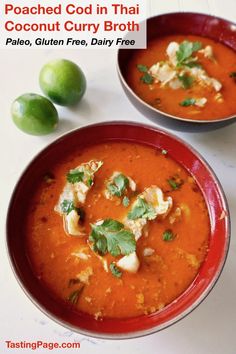 two bowls filled with soup and garnished with cilantro, limes