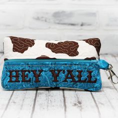 a purse with the word hey yall printed on it