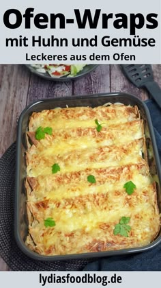 a casserole dish with cheese and herbs in it on a plate next to a fork