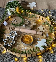 a tray with cookies and decorations on it