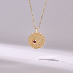 Introducing our Ruby Moon & Star Circle Charm Necklace, a celestial-inspired piece handcrafted with exquisite detail and elegance. Crafted from 14k solid yellow gold, this pendant features a captivating moon and star design encircling a genuine pink ruby birthstone disc, adding a touch of celestial beauty to your ensemble. The radiant pink ruby symbolizes love, passion, and vitality, making it the perfect birthstone for those born in July or anyone who appreciates its vibrant hue. 𝐈𝐭𝐞𝐦 𝐃𝐞? Celestial Gold Gemstone Jewelry, Celestial 14k Gold Birthstone Jewelry, Celestial Style 14k Gold Birthstone Jewelry, Celestial Yellow Gold Jewelry With Star Charm, Celestial Yellow Gold Jewelry With Birthstone, Celestial Style Yellow Gold Birthstone Jewelry, Celestial Yellow Gold Gemstone Necklaces, Celestial Gemstone Necklace In Yellow Gold, Celestial Star-shaped Gemstone Jewelry