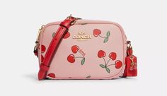 Printed coated canvas and smooth leather Two credit card slots Inside multifunction pocket Zip closure, fabric lining Outside open pocket Detachable strap with 22 3/4" drop for shoulder or crossbody wear 7 1/2" (L) x 5 1/4" (H) x 2 1/4" (W) Style No. CE655 Designer Handbag Storage, Luxury Bags Collection, Handbag Storage, Fashion Things, Handbag Essentials, Girly Bags, Girly Accessories, Small Charms, Cherry Print