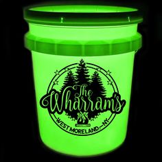 a green light up jar with the words, the whirrams west moreland ny on it