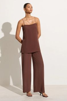 Shop the Koa Tunic Top in Tobacco from Faithfull the Brand. A brown silk camisole top with a longline length, straight neckline and thin adjustable straps. Express Delivery Available. Monikh Dale, Silk Camisole Top, Brown Tunic, Macrame Dress, Relaxed Trousers, Crochet Maxi, Silk Trousers, Silk Camisole, Brown Silk