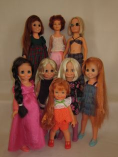 a group of dolls standing next to each other