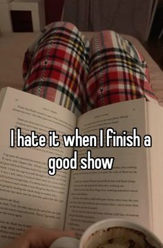 someone is reading a book and holding a coffee mug in their hand, with the caption i hate it when i finish a good show