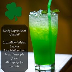 a tall glass filled with green liquid next to a shamrock leaf and text that reads lucky leprechaun cocktail