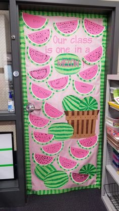 a door decorated with watermelon slices and the words our class is one in a melon