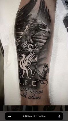 a man with a tattoo on his arm that has an eagle and the words f c