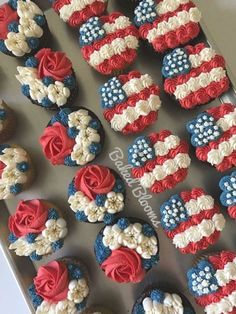 cupcakes with red, white and blue frosting in the shape of american flags