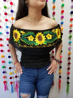 Summer Festival Off-shoulder Blouse, Casual Off-shoulder Tops For Festival, Bohemian Fitted Off-shoulder Top, Black Off-shoulder Top For Vacation, Short Sleeve Tops For Fiesta, Fitted Off-shoulder Embroidered Top, Embroidered Tops For Summer Fiesta, Embroidered Tops For Fiesta In Summer, Bohemian Tops For Summer Fiesta