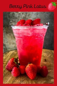 a pink drink with strawberries on the side and text berry pink latass