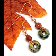 Dark Green And Earth Toned Jasper Stone Circles And Red Goldstone Round Beads, Joined By Bright Copper Wire. Circle Diameter 10mm Thickness 4mm Length Including Hooks 1.6”. **Please Note: Earrings Pictured Are A Representative Pair; These Are Made To Order And Natural Stones' Coloration And Patterns May Vary Slightly From Those In Photo.** Red Goldstone, Autumn Dark, Stone Circles, Ear Art, Gold Bead Earrings, Stud Fashion, Bright Copper, Green Jasper, Agate Earrings