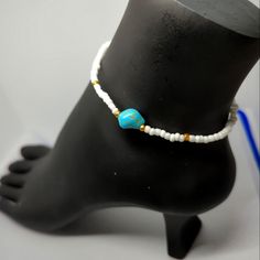 Elevate Your Summer Look With This New With Tags, Handmade Beaded Anklet Bracelet. The White And Turquoise Colors Give A Beachy Vibe That's Perfect For Any Summer Occasion, From Engagement Parties To Summer Picnics. The Anklet Is 8.5" In Length And Features A Faux Turquoise Nugget As The Main Stone. The Pull On Closure Adds An Extra Touch Of Elegance To This Piece, Making It Not Only Stylish But Also Functional. This Anklet Is Made From Beads And Stretch Cord Material And Adorned With Gold Beads Adjustable White Anklets With Colorful Beads, Turquoise Beaded Festival Anklets, Turquoise Beaded Anklets, White Beaded Anklets With Round Beads, Casual Beaded Turquoise Anklets, Casual Turquoise Beaded Anklets, White Round Beads Anklets For Vacation, White Beaded Anklets For Festival, White Beaded Festival Anklets