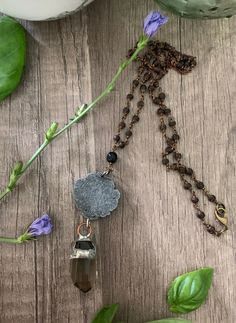 This is a vintage Victorian style pendant that has been up cycled. It has a pretty smokey quartz attached and all of it was hand made by me, the hand beaded necklace compliments the over all feel of this pretty necklace. Handmade Vintage Beaded Necklaces For Meditation, Bohemian Brown Pendant Crystal Necklace, Bohemian Brown Necklace With Large Pendant, Handmade Brown Smoky Quartz Jewelry, Brown Spiritual Crystal Pendant Necklace, Spiritual Brown Crystal Pendant Necklace, Brown Pendant Crystal Necklace For Jewelry Making, Unique Handmade Brown Crystal Necklace, Brown Hand-wrapped Necklace For Healing