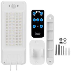 an image of a remote control light with screws