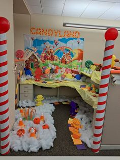 an office cubicle decorated with candy land decorations