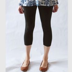 Womens cropped cotton leggings.  A wardrobe staple. They are perfect for wearing under tunics, skirts and dresses!  Made of soft 4 way stretch cotton lycra, these leggings have a 3.5" fold over high waist waistband, which you can wear up for tummy support or fold down to wear at your hip. The soft cotton lycra waistband allows for easy pull on style.  All seams are serged and reinforced at the crotch, and hemmed.  Cropped length hits about mid calf.  Inseam =  23.5" *Length can be lengthened or shortened as you'd like  (for reference I'm 5'5" modeling a size Medium) See Swatch Chart in the last photo for other Color options. Garments are Made To Order Please allow 7-10 days for your item to be sewn Below are my standard size measurements, which are simply a guideline, if you would like to Comfortable Bottoms For Yoga In Spring, Versatile Relaxed Fit Yoga Pants For Spring, Relaxed Fit Cotton Knee-length Capris, Fitted Ankle-length Capris For Fall, Stretch Cotton Capris For Work, Stretch Capri Yoga Pants With Elastic Waistband, Stretch Cotton Knee-length Capris, Spring Yoga Leggings With Relaxed Fit, Casual Knee-length Yoga Leggings