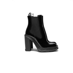 Black Shine Brush-Off Leather Chelsea Boot With A Thick Rubber Tread Sole And Stacked Heel. The Boot Features Tonal Elastic Side Panels. Boot Silhouette With A Round Toe Shape. Finished With An Alexander Mcqueen Signature On The Sole. Material: 100% Calf Leather Made In Italy. Sku: 678530whz84-1000 Elegant Patent Leather Platform Boots With Reinforced Heel, Black Pointed Toe Heels With Lug Sole, Black Closed Toe Heels With Lug Sole, High Heel Patent Leather Boots With Lug Sole, Elegant Patent Leather Platform Boots With High Heel, Elegant Patent Leather High Heel Platform Boots, Formal Pointed Toe Heels With Lug Sole, Elegant High Heel Platform Boots In Patent Leather, Elegant High Heel Patent Leather Platform Boots