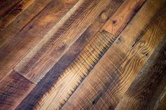 wood flooring that looks like it has been made from different types of planks