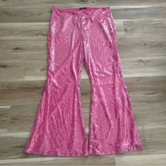 Approximate Measurements In Photos. From Retailer’s Site: Party Time. Our Plus Size Sequin Flare Pants Are Destined For Dancefloors, And Can Be Styled With The Coordinating Top. Plus Size Sequin Kick Flare Pants Plus Size Flare Pants Sequin Pants Comfortable High Waist Seamless Design Model Wears A Size L (Us Size 12-14/Uk Size 16-18). Feel The Music - It's Time To Shop Festival Outfits. Keep It Cute In Boho Clothing Or Hit The Pit In Rave Outfits Designed To Thrill. We'll See You Backstage. Mai Glamorous Pink Stretch Bottoms, Glamorous Pink Bottoms For Night Out, Festive Pants For Party Season, Stretch Pink Sequined Pants, Pink Stretch Pants For Party, Pink Sequined Pants For Party, Pink Long Pants For Night Out, Pink Sequined Party Pants, Pink Trousers For Night Out