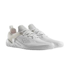 a white tennis shoe on a white background