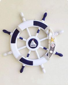 there is a ship steering wheel on the wall