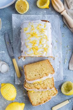 slices of lemon pound cake with icing and sliced lemons on the side next to it