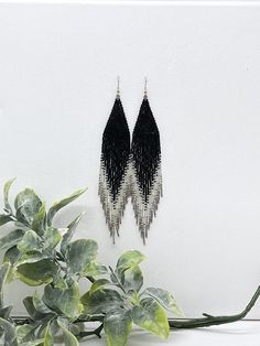 "Seed beaded earrings, handwoven one glass seed bead at a time 100% handmade original design Not for wholesale Made out of high quality Japanese glass seed beads Color palette Black Shimmering silver Silver color Palladium plated seed beads Dimensions Length 6\" including ear wire (15.2cm) Width 1\" (2.5cm) Weight per each earring approx 0.14 oz (4gm) Closure - Silver plated hypoallergenic surgical steel earwires - Brass leverbacks - brass clip-ons for non pierced ears I hope you will love your Seed Beaded Earrings, Gold Galaxy, Time 100, Earrings Unique, Beaded Fringe, Unique Gifts For Her, Seed Bead Earrings, Earrings Boho, Fringe Earrings