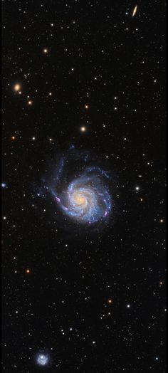 an image of a spiral galaxy in the sky