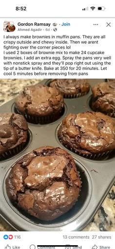 some chocolate muffins sitting in a pan on top of a counter