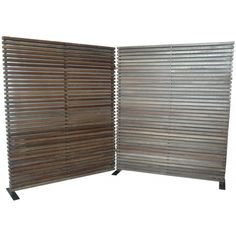 a room divider made out of metal slats with wooden slats on the sides