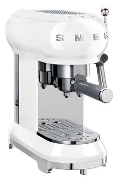 an espresso machine on a white background with the word smeg written below it