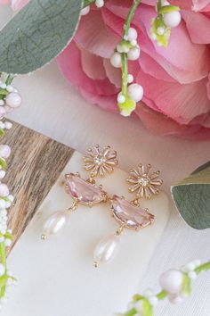 Pearl and Pink Stone Earrings Gold Daisy Earring Pearl Drops - Etsy Pink Feminine Dangle Pearl Earrings, Feminine Pink Pearl Drop Earrings, Feminine Pink Pearl Earrings For Party, Pink Pearl Charm Jewelry For Wedding, Pink Feminine Pearl Earrings For Wedding, Feminine Pink Pearl Earrings For Wedding, Delicate Pink Dangle Pearl Earrings, Delicate Pink Pearl Earrings, Pink Pearl Bridal Earrings As Gift