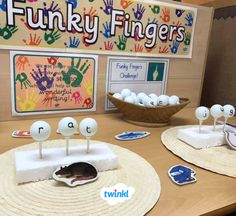 this is an image of a table set up for children to play with their fingers