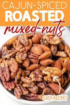 closeup of a bowl of spicy mixed nuts with Cajun seasoning Spicy Roasted Nuts Recipe, Savory Mixed Nuts Recipes, Spicy Nuts Recipe Holidays, Holiday Nuts Recipes, Christmas Nuts Recipes, Spiced Nuts Recipe Savory, Mixed Nuts Recipes Snacks, Flavored Nuts Recipes, Seasoned Nuts Recipe