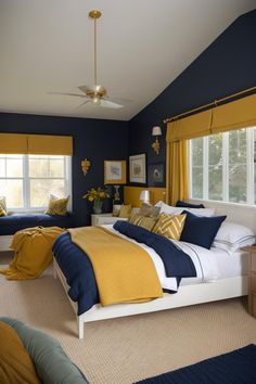 a bedroom with blue walls and yellow curtains