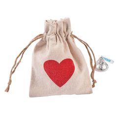 a small bag with a red heart on it