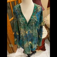 New Without Tags Perfect Conditionnever Worn Raviya Beaded & Jewel V Neck Green/Black Long Sleeve Tunic Shirt Sz L 100% Polyester Nwnt. Nice Beaded & Jewel Long Sleeve Tunic Shirt. Long Sleeve. Green/Black/White/Blue. Never Worn. Pit To Pit 22.5 Length 30 Bohemian V-neck Blouse For Festive Occasions, Bohemian V-neck Tops For Festive Occasions, Summer Festive Embellished Blouse, Green Embellished Festive Tops, Green Embellished Tops For Festive Occasions, Festive Sequined V-neck Top, Embellished Green Tops For Festive Occasions, Festive Green Sequined Tops, Festive Green Sequin Tops