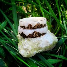 The mountains are calling! Handcarved from Illinois Whitetail Deer Antler, these simple bands are made for comfort.  Each antler ring is made to order, by hand, with naturally shed antler.  Each ring may vary slightly in color of antler and exact design of mountains. Lightweight and hypoallergenic Men's ring is Approximately 9mm wide,  Women's ring is Approximately 7mm wide. sealed for protection. Antler Rings Women, Antler Ring Men, Carving Bone, Antler Rings, Deer Antler Jewelry, Antler Carving, Deer Antler Ring, Hand Carved Ring, Antler Earrings