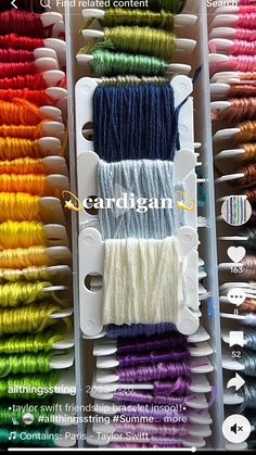 several rows of different colored threads in a box with the words cardigan on it