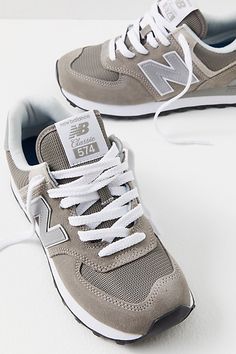 Find NEW BALANCE 574 Sneakers on Editorialist. Step out in these street-ready sneakers by New Balance, featured in a staple silhouette and soft leather upper with heritage branding, a comfy cushioned footbed, and durable rubber outsole. * Lace-up style * Durable rubber outsole * Foam cushioned midsole 574 Sneakers by New Balance in Concord Grape/Infield Clay, Size: US 6 New Balance 574 Sneakers, New Balance 574, Free People Shoes, Workout Shoes, Trendy Sneakers, Sneakers Grey, Trendy Shoes, Sneaker Heels, Athletic Sneakers