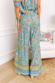 - Embrace boho style with these vibrant pants! - Unlined material with a green, orange, and purple hued paisley print - A high waistline with an elastic banded back - A relaxed silhouette that ends in wide hemlines Floral Pants, Orange And Purple, Green Orange, Paisley Print, Boho Style, Elastic Band, Boho Fashion, Paisley, High Waist