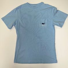 Vineyard Vines Mens Xs Whale Short Sleeve Pocket Tee. Light Blue. Brand New. Never Worn. Smoke-Free Home. Self Cuffs And Hem. Ribbed Collar. Graphic On Chest Pocket And Back. East Hampton Written Under Graphic On Both Pocket And Back. Vineyard Vines Shirts, East Hampton, Pocket Tee, Vineyard Vines, Chest Pocket, Vines, Tee Shirts, Light Blue, Mens Shirts